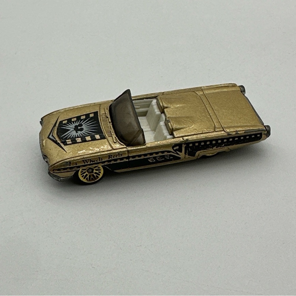Vintage Hot Wheels ‘53 T-Bird Gold/black “Hot Wheels Reels “1996‎ Thailand